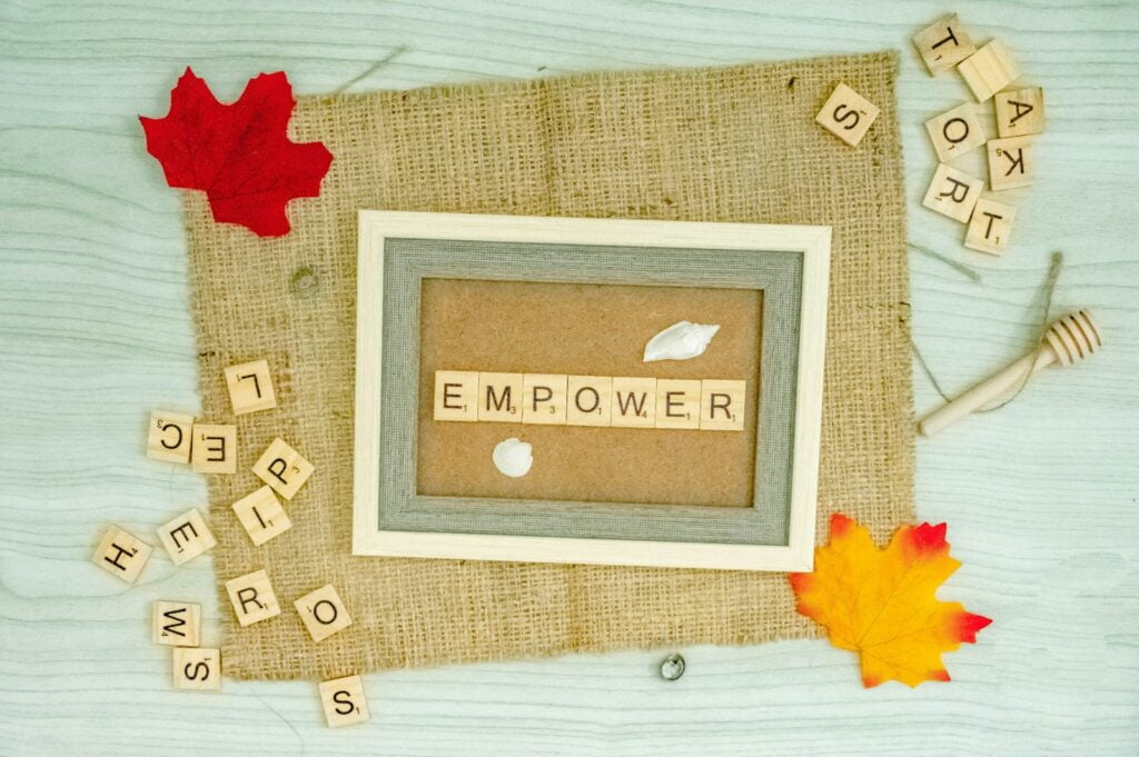 a picture frame with the word emporer spelled in scrabble, advocacy